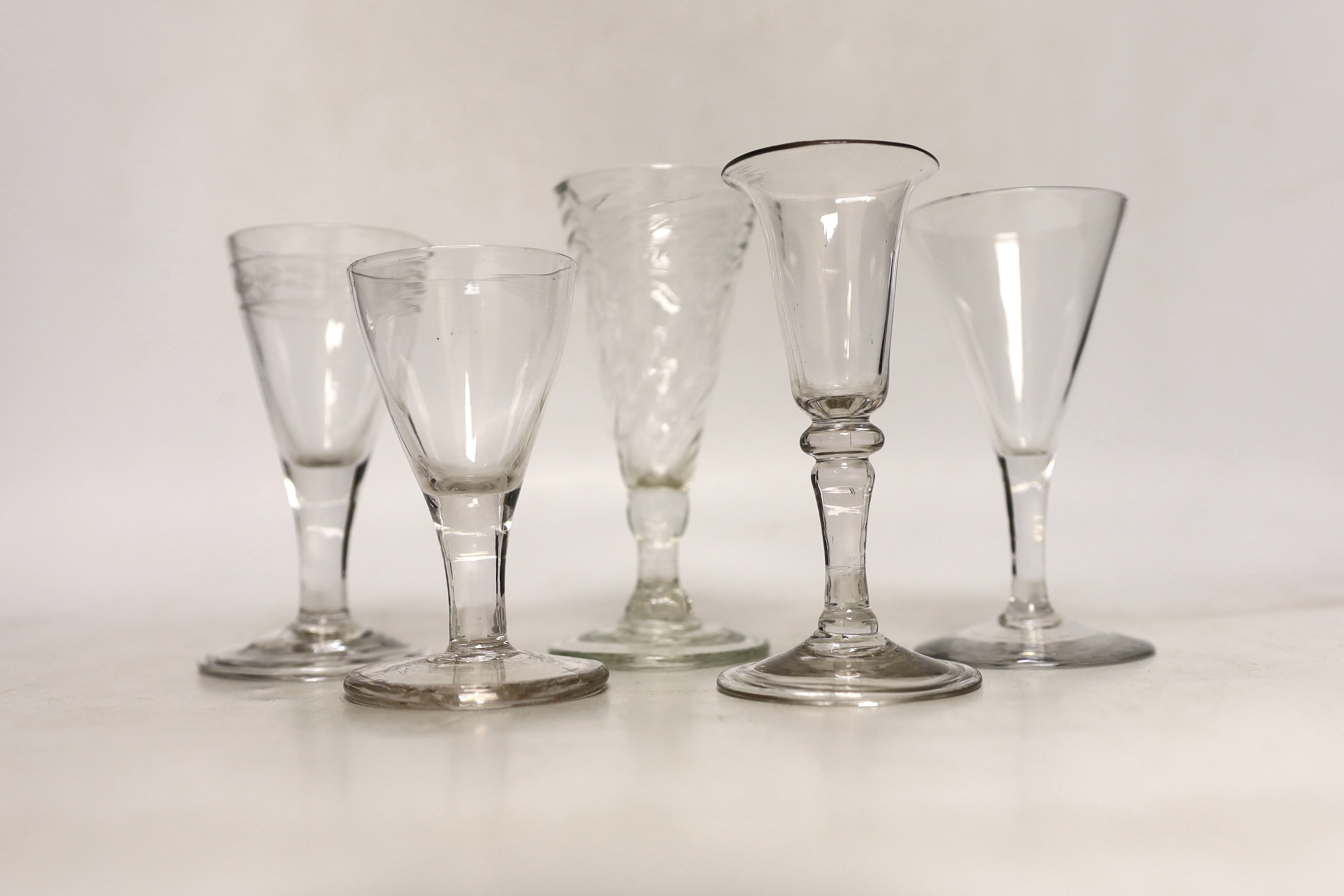 A wrythen ale glass and four others, late 18th and 19th century, tallest 13cm